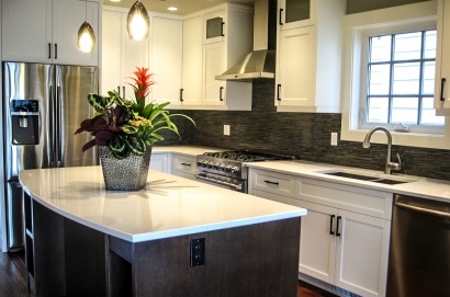 Custom-designed modern kitchen before we moved to Lethbridge Alberta by Marden Construction. A nice balance of light and dark cabinetry finished with quality woodwork.